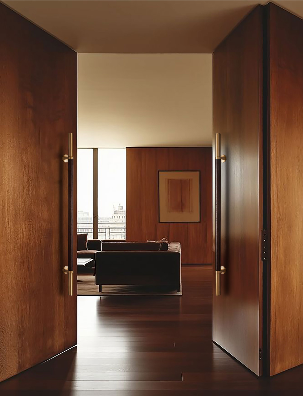 Two long timber-toned and brass-coloured pull handles fitted to dark timber double doors.