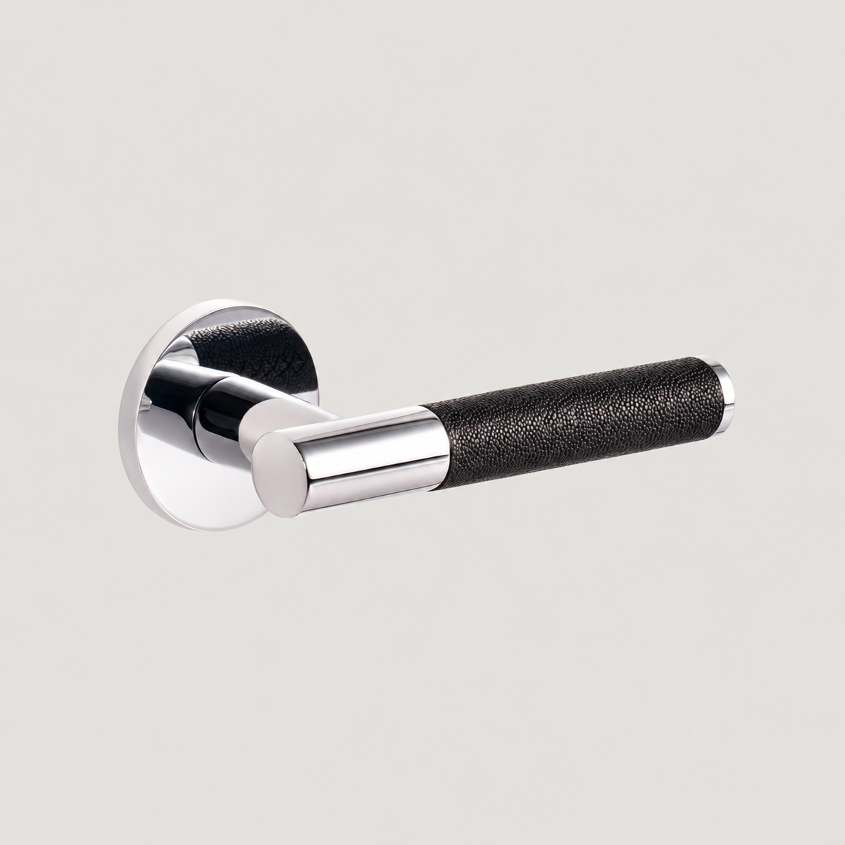 Cavallo door lever with polished nickel finish and black lychee leather grip