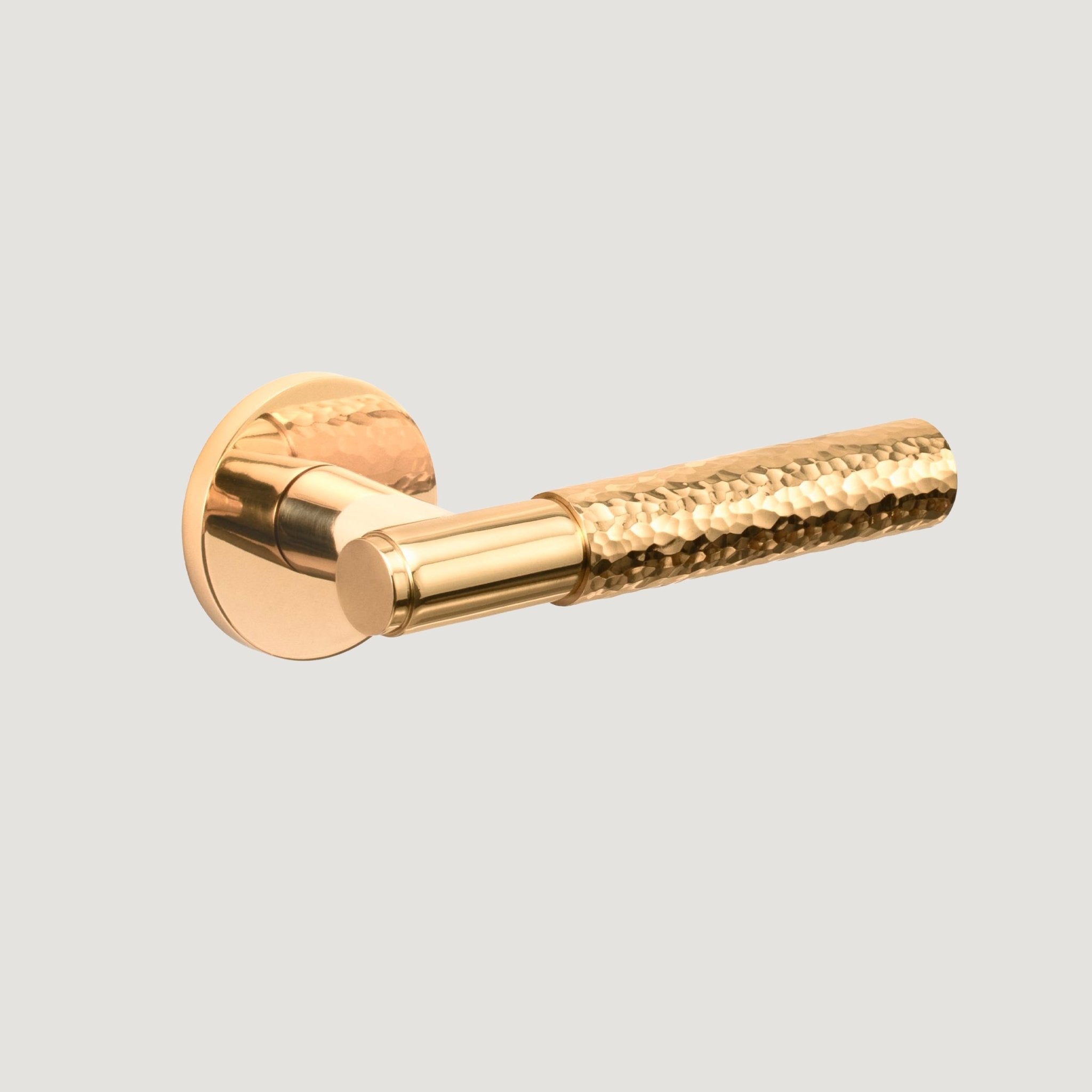 Martello solid brass door lever with full-length hand-hammered texture — Polished Brass, Bergamo Design