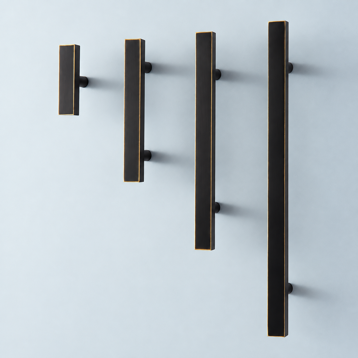 Asta Quadra Black Brass square cabinet handles and knob with exposed brass edges