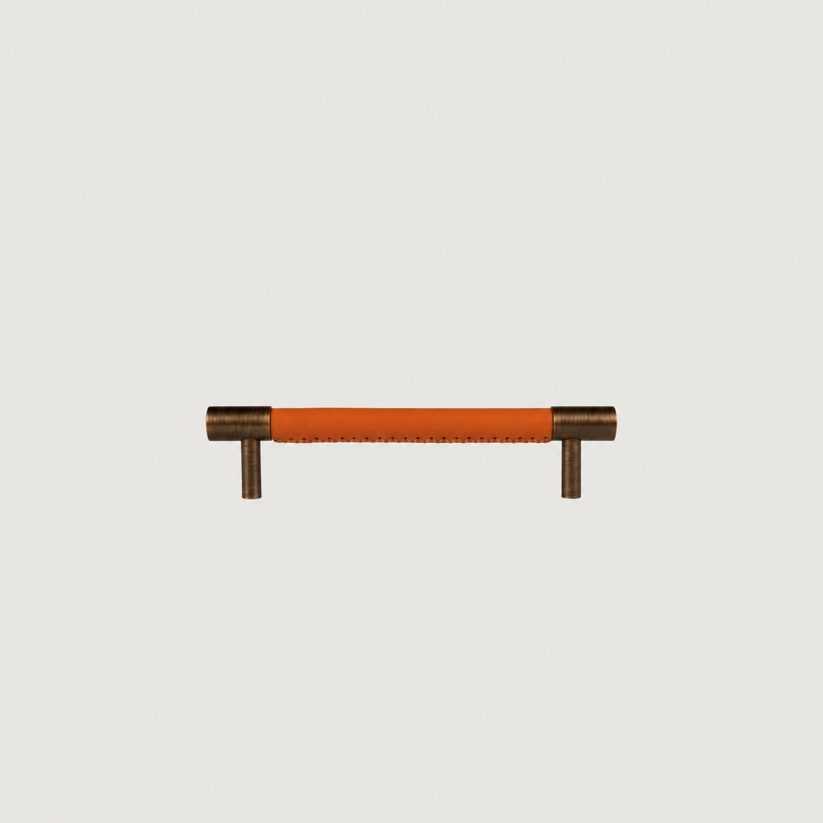 Cavallo cabinet handle, orange leather, antique brass, 128mm screw spacing