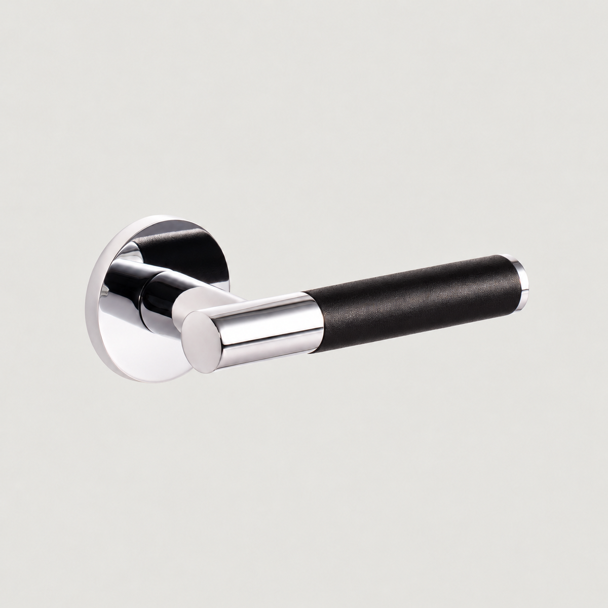 Cavallo door lever with polished nickel finish and high-gloss black lychee leather grip