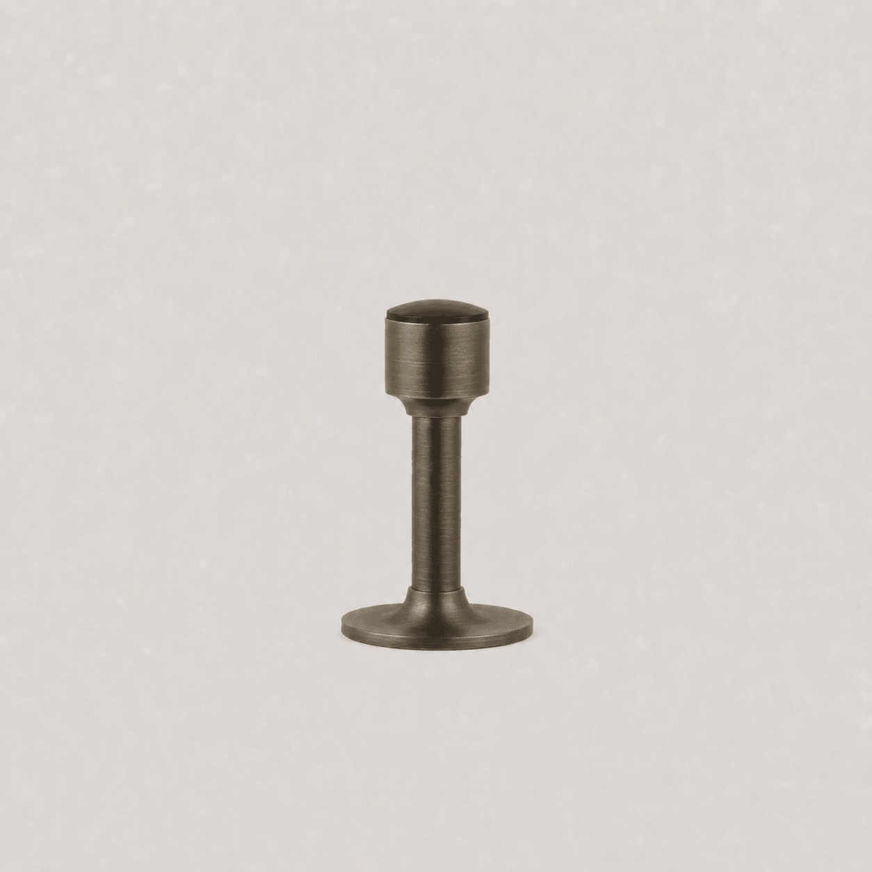 Faro Solid Brass Wall-Mounted Door Stop – Antique Brass - Bergamo Design