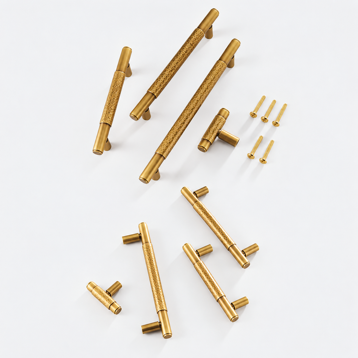 Martello Centro aged brass cabinet handles with hammered centre detail