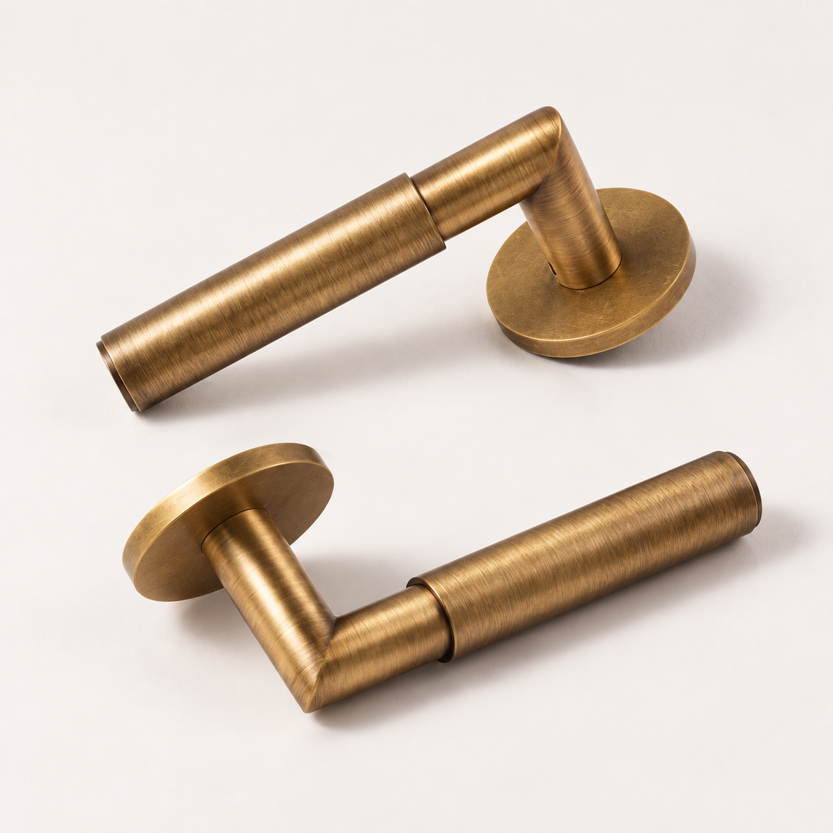 Ruvo aged brass cylindrical door lever pair