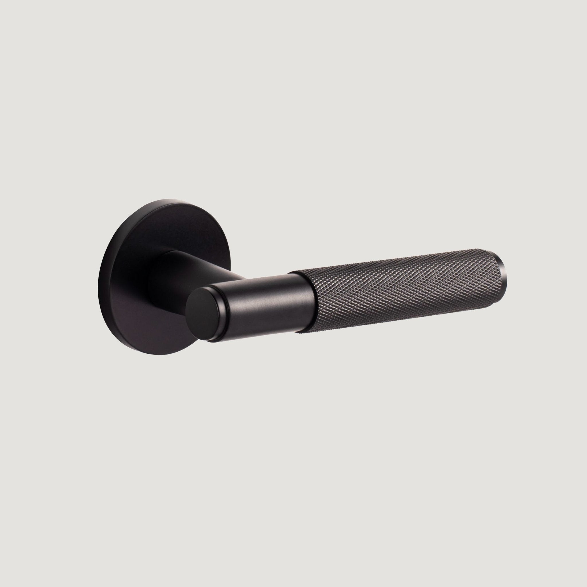 Trama solid brass door lever with substantial rose and diamond knurled grip, Matte Black, Bergamo Design