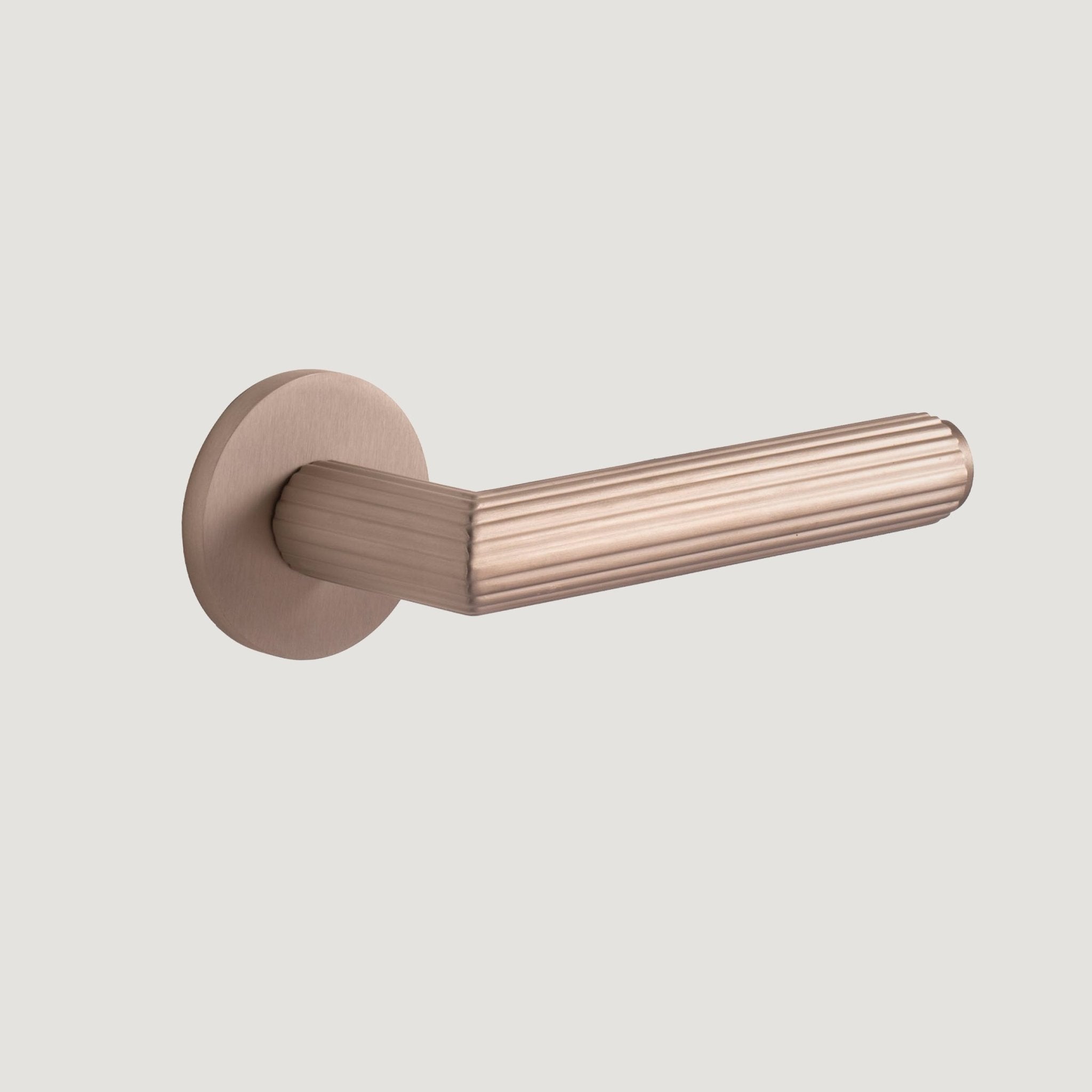 Ornato solid brass door lever with fluted form and flat rose — Nickel, Bergamo Design